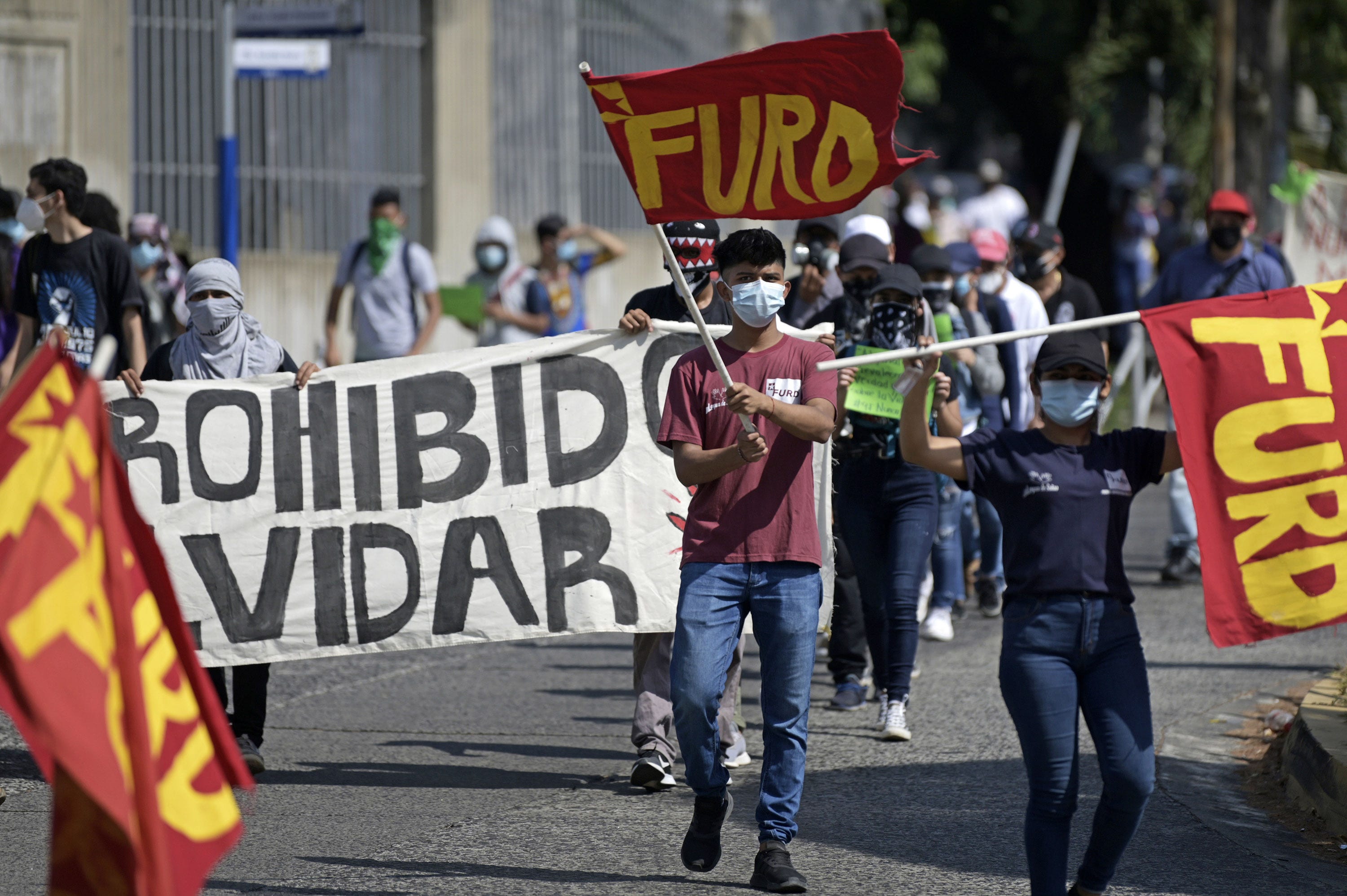 Students from the University of El Salvador rally against Salvadoran President Nayib Bukele in February, a year after a military incursion into the Legislative Assembly in San Salvador.