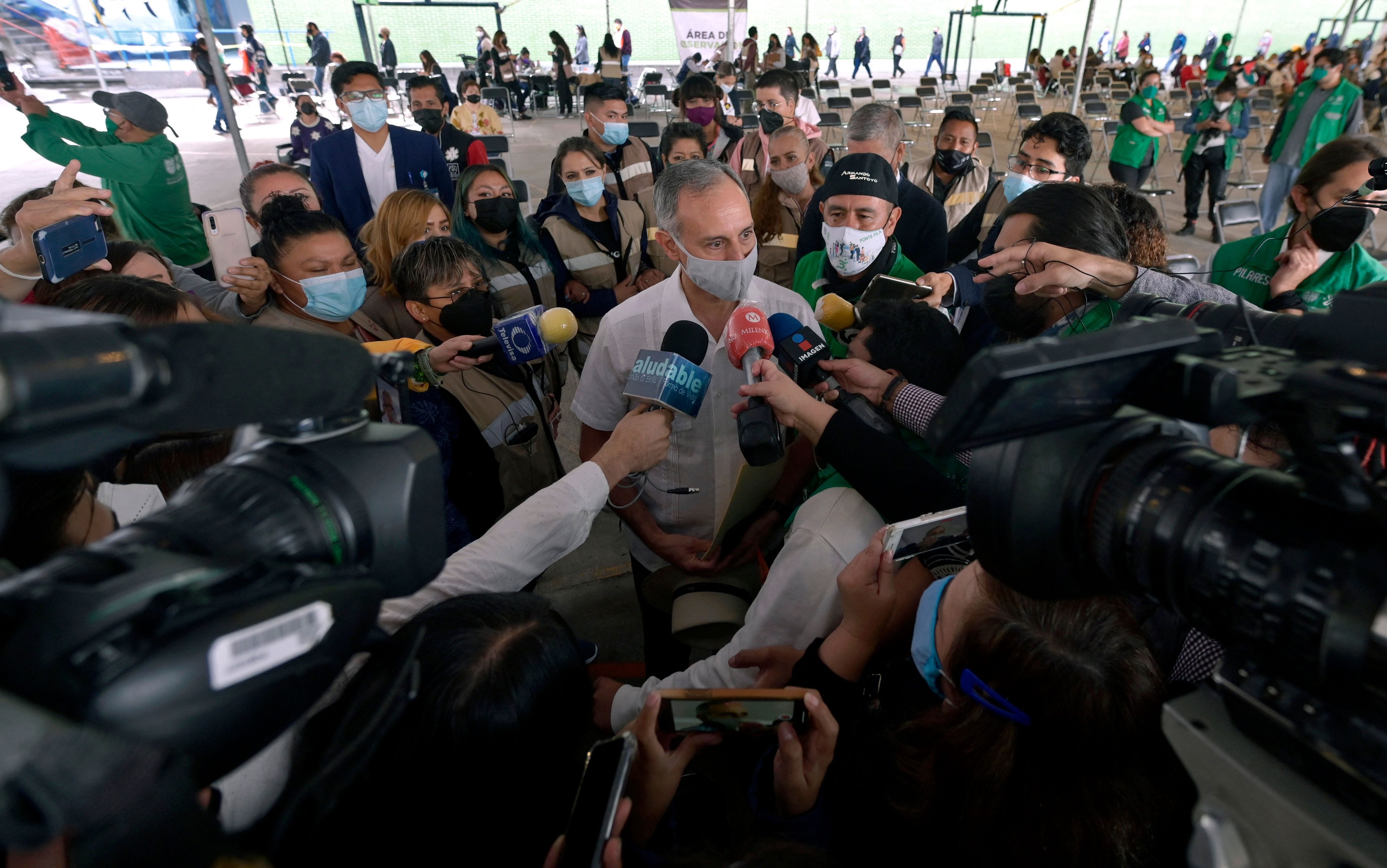 Mexico's undersecretary of health, Hugo Lopez-Gatell, speaks after receiving his first dose of the Pfizer-BioNTech vaccine against COVID-19 at a vaccination center May 13 in Mexico City.
