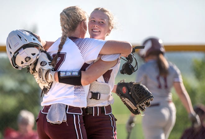 Tremont catcher Jenna Getz, facing, and pitcher Paige McAllister embrace after a strikeout Friday, June 4, 2021 to end the Class 2A Softball Regional title game in Tremont. The Turks defeated the IVC Grey Ghosts 3-2.