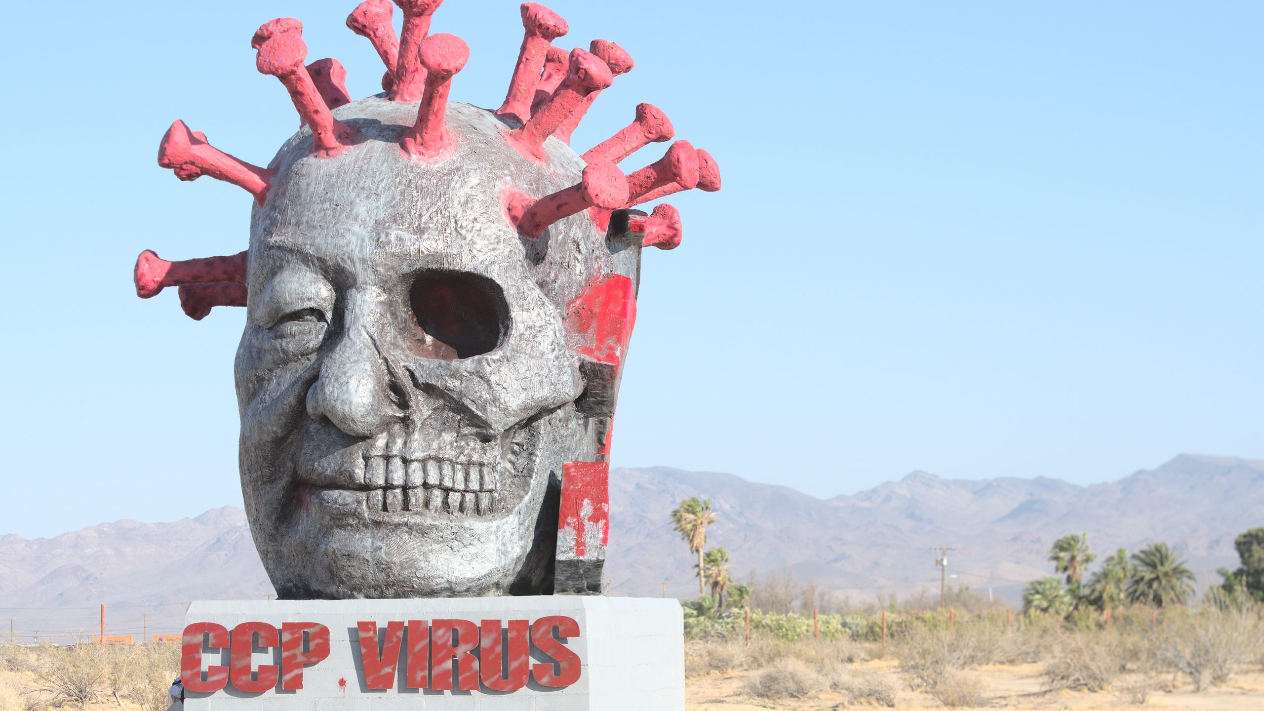 "CCP Virus," artist Weiming Chen's critique of the Chinese government, was unveiled at Liberty Sculpture Park in Yermo on Friday, June 4, 2021.