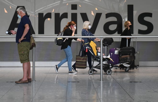 Travel restriction levels lowered for dozen of countries by CDC