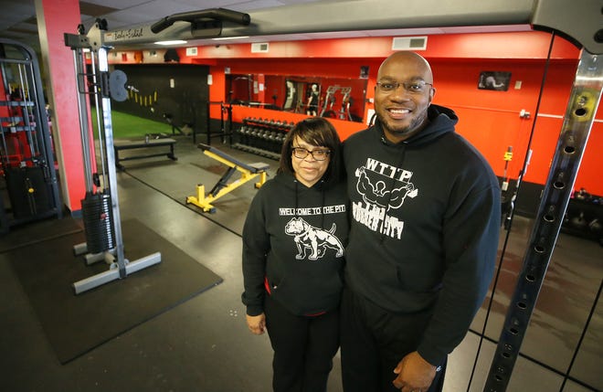 Margo and Toby Easterling owners of Welcome to the Pit a 24-hour gym they opened three years ago in Akron on Wednesday June 3, 2021.