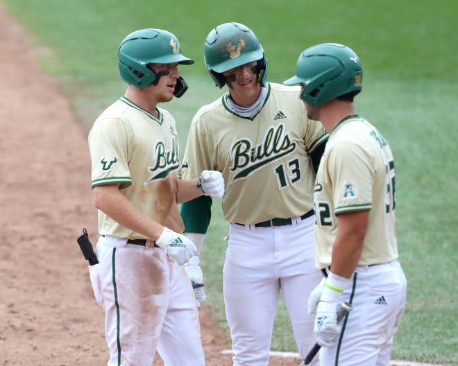 South Florida players celebrate a home run hit by Carmine Lane, left, during a Gainesville Regional win over Florida last weekend. The Bulls, who were seeded fourth in the regional, are heavy underdogs again in this week's Austin super regional. “We are the underdogs and we have nothing to lose," USF's Orion Kerkering said. "When we were the lowest seeds, we had nothing to lose. We just went out and played ball."