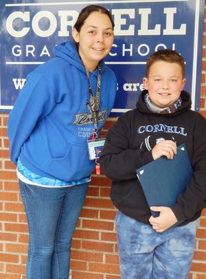 At left, Owen Hart, son of Ryan and Susie Hart, Cornell, was named as the kindergarten-fourth grade student of the month for May at Cornell Grade School. Hart, with nominating teacher Abby Holcomb, received a certificate and was presented with a Walmart gift card at an all-school assembly. At right, Belle Gonis, daughter of Tonya Gonis and Robert Swisher, Cornell, was named as the fifth-eighth grade student of the month for May at Cornell Grade School. Gonis, with nominating teachers Mary Janssen, Melissa Haller and Karen Austin, was also presented with a Walmart gift card at an all-school assembly. Each month Cornell Grade School selects two students — one from kindergarten through fourth grade, and one from fifth-eighth grade — who best demonstrates a good attitude, respect for others, dependability, hard work, volunteerism, honesty, trustworthiness, and leadership. Each student receives a Student of the Month certificate and will have their picture on display in the main hallway at Cornell Grade School.
