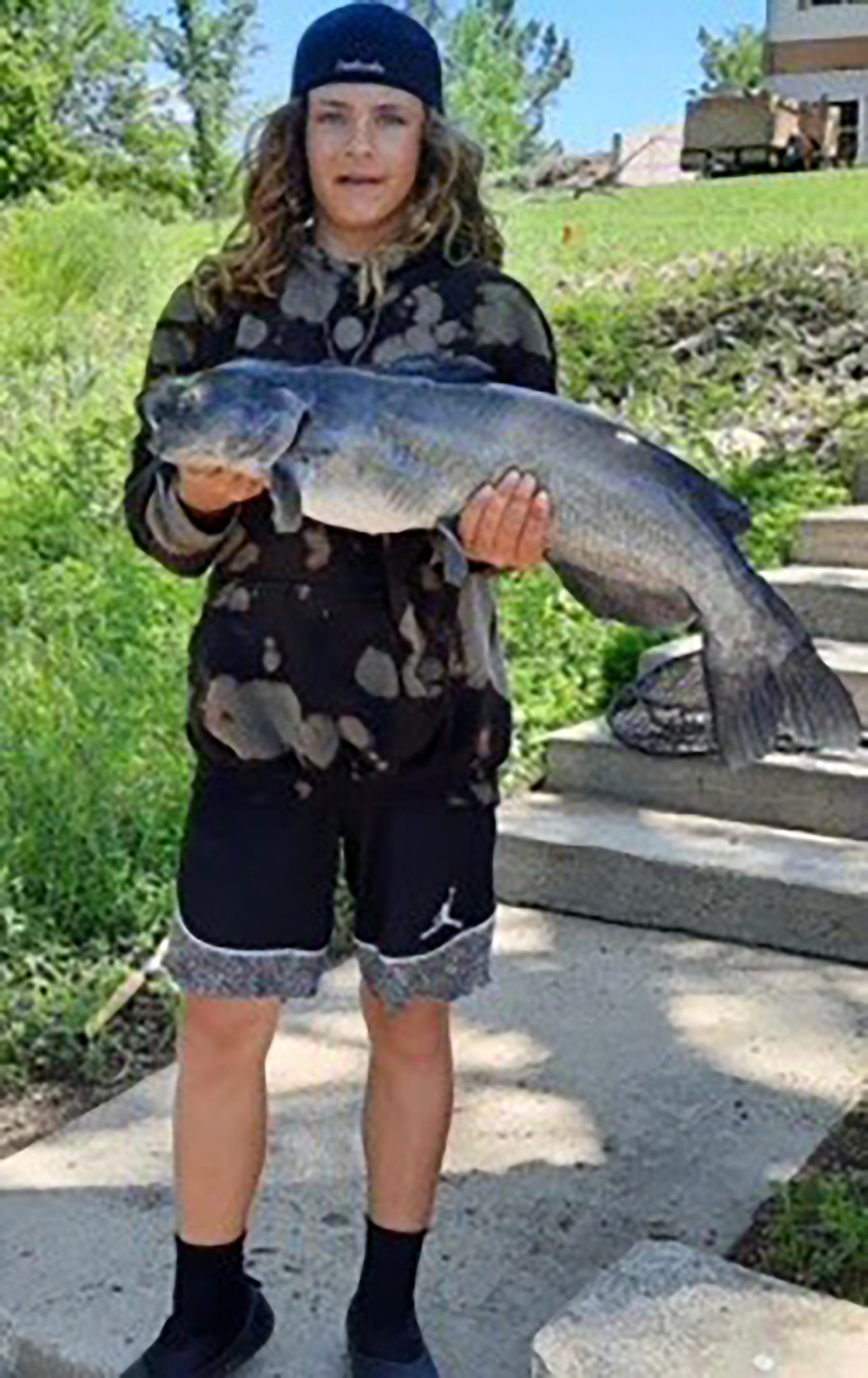 Salina teen catches personalbest catfish weighing almost 14 pounds at