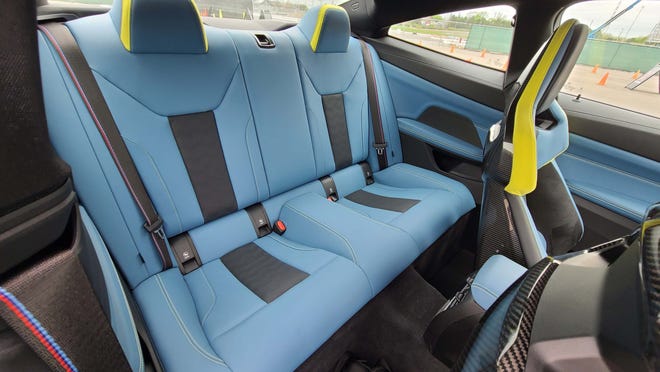 Unlike 2-seat sports cars, the 2021 BMW M4 has a working back seat.