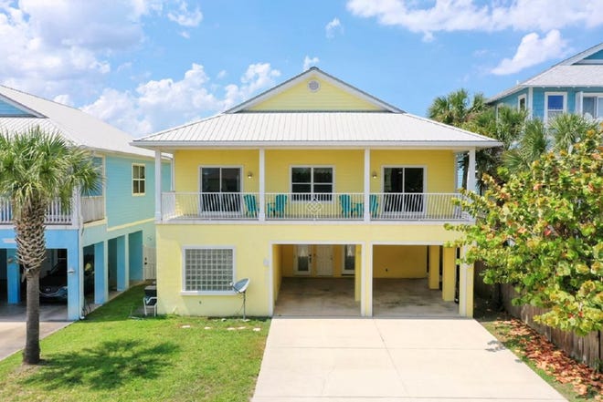 Walk to the beach, the Flagler pier, amazing shops and restaurants from this multi-family home, with two units.