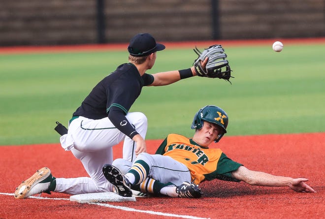 Action from the Trinity-St.X Seventh Regional baseball game at Jim Patterson Stadium.  June 8, 2021