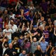Phoenix Suns fans in the crowd cheer against the Denver Nuggets in the second half during game one in the second round of the 2021 NBA Playoffs at Phoenix Suns Arena.