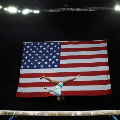Simone Biles competes on the balance beam during t