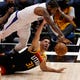 Second round: Clippers guard Paul George (13) scrambles for a loose ball against Jazz forward Georges Niang (31) during the fourth quarter of Game 1.