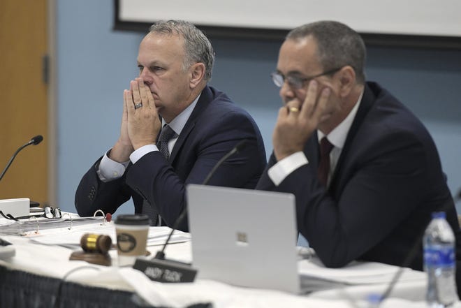 Richard Corcoran, the Commissioner of the Florida Department of Education sits next to Florida Department of Education Board Chair Andy Tuck as they listen to speakers during Thursday morning's Florida Department of Education meeting.