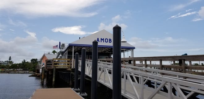 Anna Maria Oyster Bar, which has multiple locations including this one on Anna Maria Island's historic Bridge Street Pier, is offering dad a complimentary beverage for Father's Day.