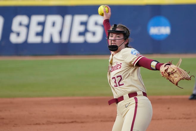 Florida State's Kathryn Sandercock pitches against Oklahoma in the first inning of the second game of the NCAA Women's College World Series softball championship series, Wednesday, June 9, 2021, in Oklahoma City. (AP Photo/Sue Ogrocki)