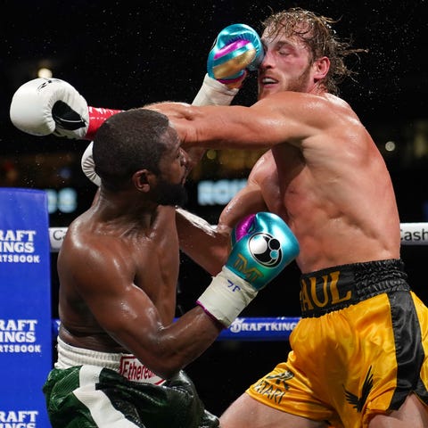 Floyd Mayweather Jr. fights Logan Paul during an e