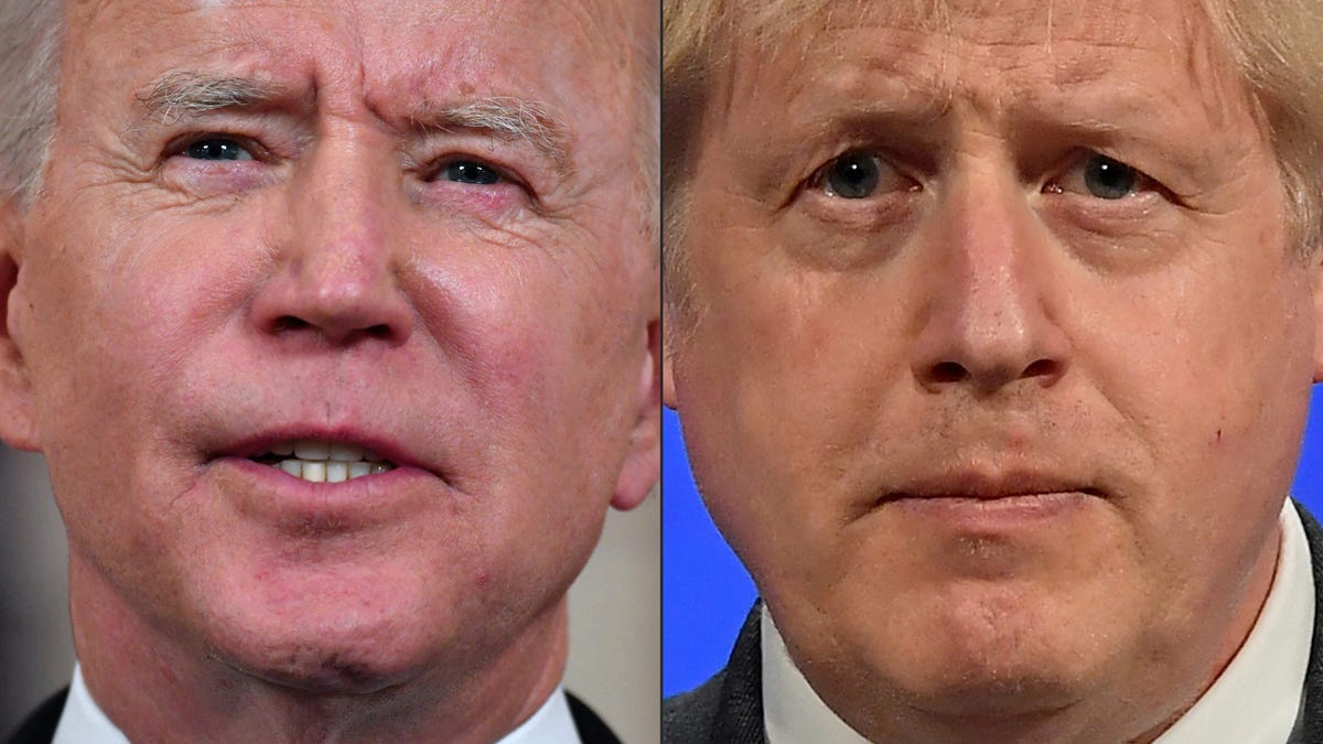 This combination of file pictures created on June 08, 2021 shows US President Joe Biden (L) as he delivers remarks on the Middle East in the Cross Hall of the White House, in Washington, DC on May 20, 2021, and Britain's Prime Minister Boris Johnson as he gives an update on the coronavirus Covid-19 pandemic during a virtual press conference inside the new Downing Street Briefing Room in central London on April 20, 2021.