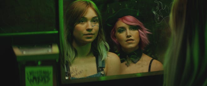 Sylvie Mix (left) and Bobbi Kitten in a still from "Poser"