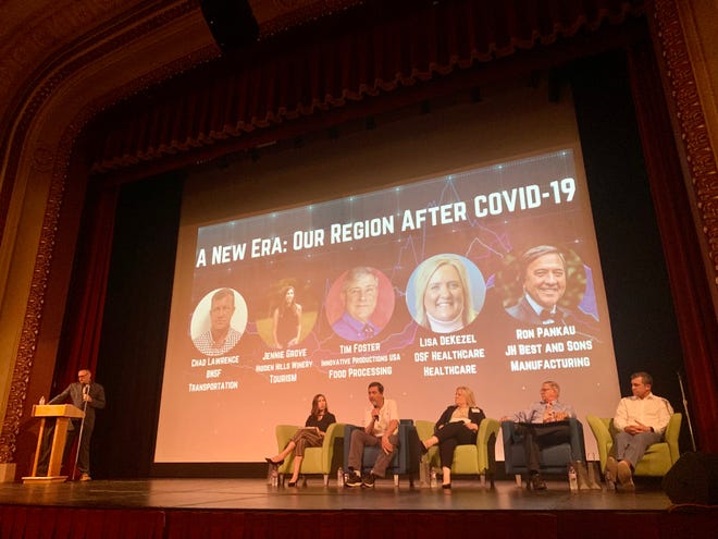 Ken Springer, left, president of the Knox County Area Partnership for Economic Development, hosted a panel discussion Thursday at the Orpheum Theatre with leaders of five key industries in the region.