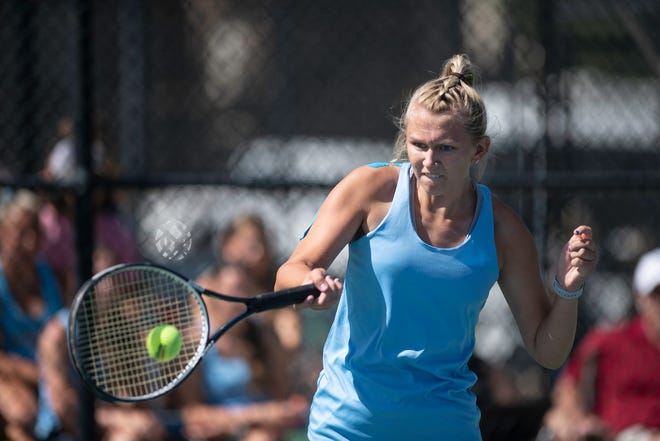 Pueblo West High School's Jordan Hunt returns a serve during the first round No. 3 singles match of the Class 4A girls state tennis tournament at Pueblo City Park on Friday June 11, 2021.