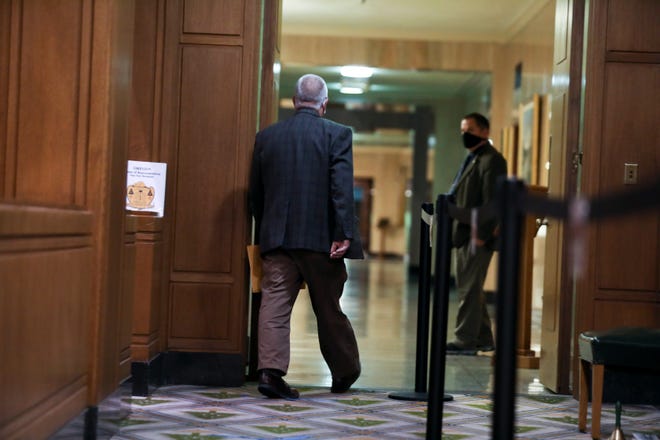 Rep. Mike Nearman leaves the Oregon House of Representatives after the vote to expel on Thursday evening.