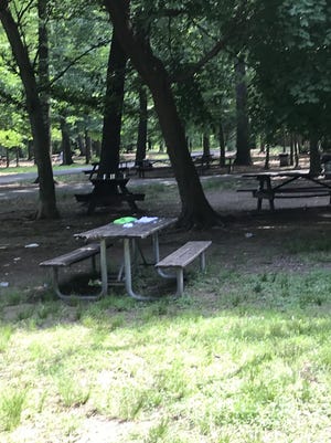On a recent Monday, there was garbage and trash strewn all over Neshaminy State Park and the parking lot despite numerous trash cans and receptacles for recycling.