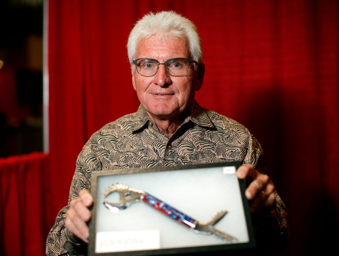 Chickasaw bladesmith Daniel Worcester displays some of his work during the Red Earth Festival.