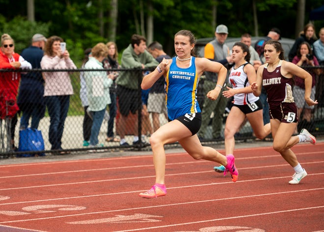 Whitinsville Christian's Kira Simoncini stays ahead of competitors during the 100-meter dash at Saturday's district class meet.
