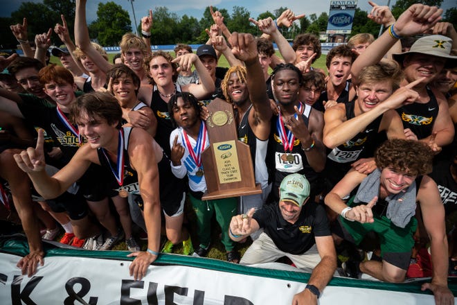 St. Xavier celebrates winning the KHSAA BoysÕ 3A State Track & Field Championship on Saturday, June 12, 2021, at the University of Kentucky outdoor track & field complex in Lexington, Kentucky.