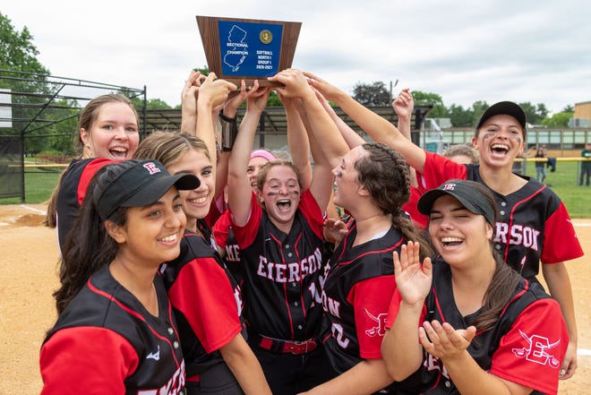 The Emerson High School softball team celebrates winning the North 1, Group 1 sectional title in Emerson, NJ on Saturday, June 12, 2021.