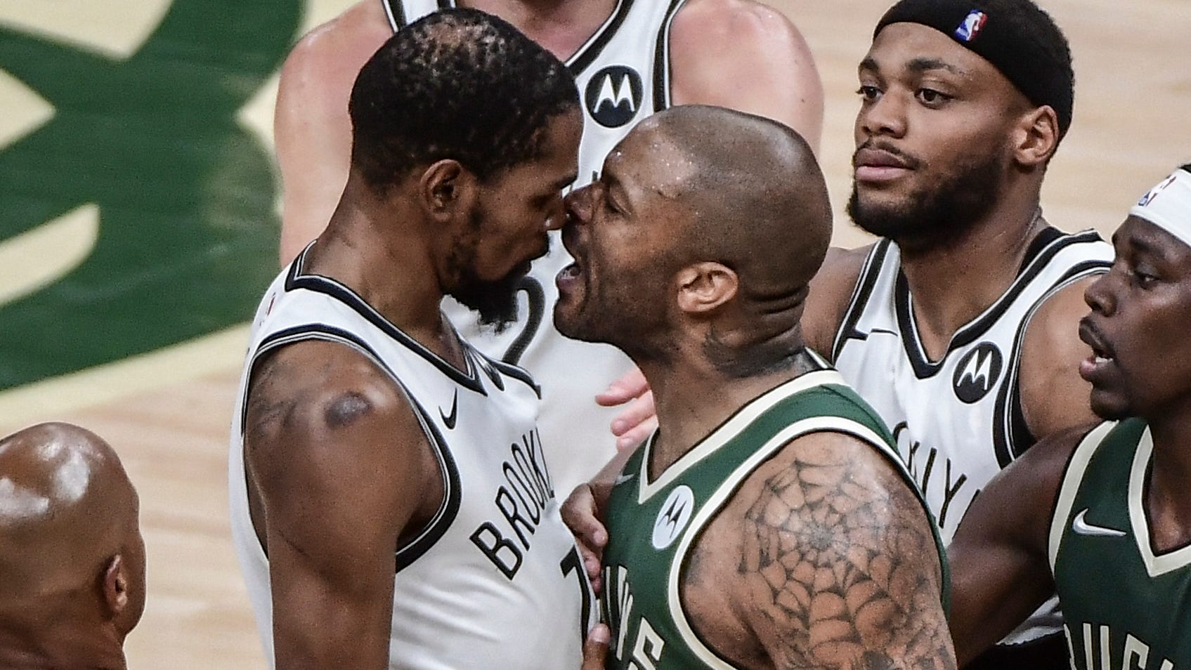 NBA reprimands Nets security guard who shoved Bucks' P.J. Tucker during altercation with Kevin Durant - USA TODAY