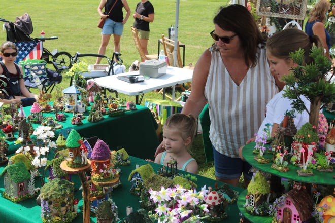 The annual Port Clinton Arts and Crafts Festival was hosted for the first time at Waterworks Park, where around 70 exhibitors shared their work.