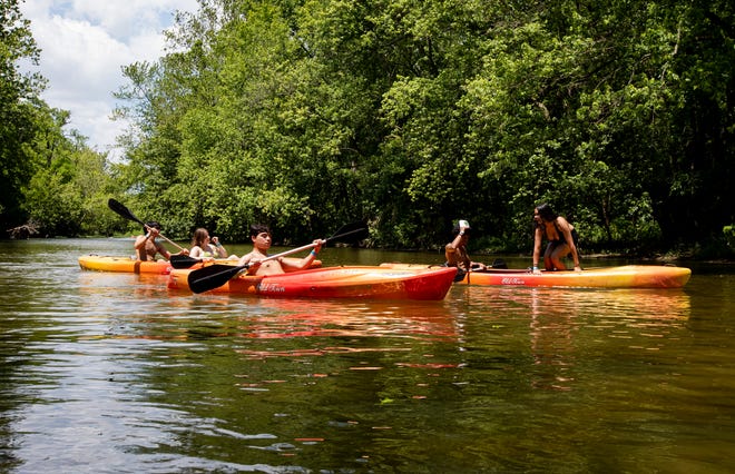 People enjoy kayaking together on Big Darby Creek in Grove City.