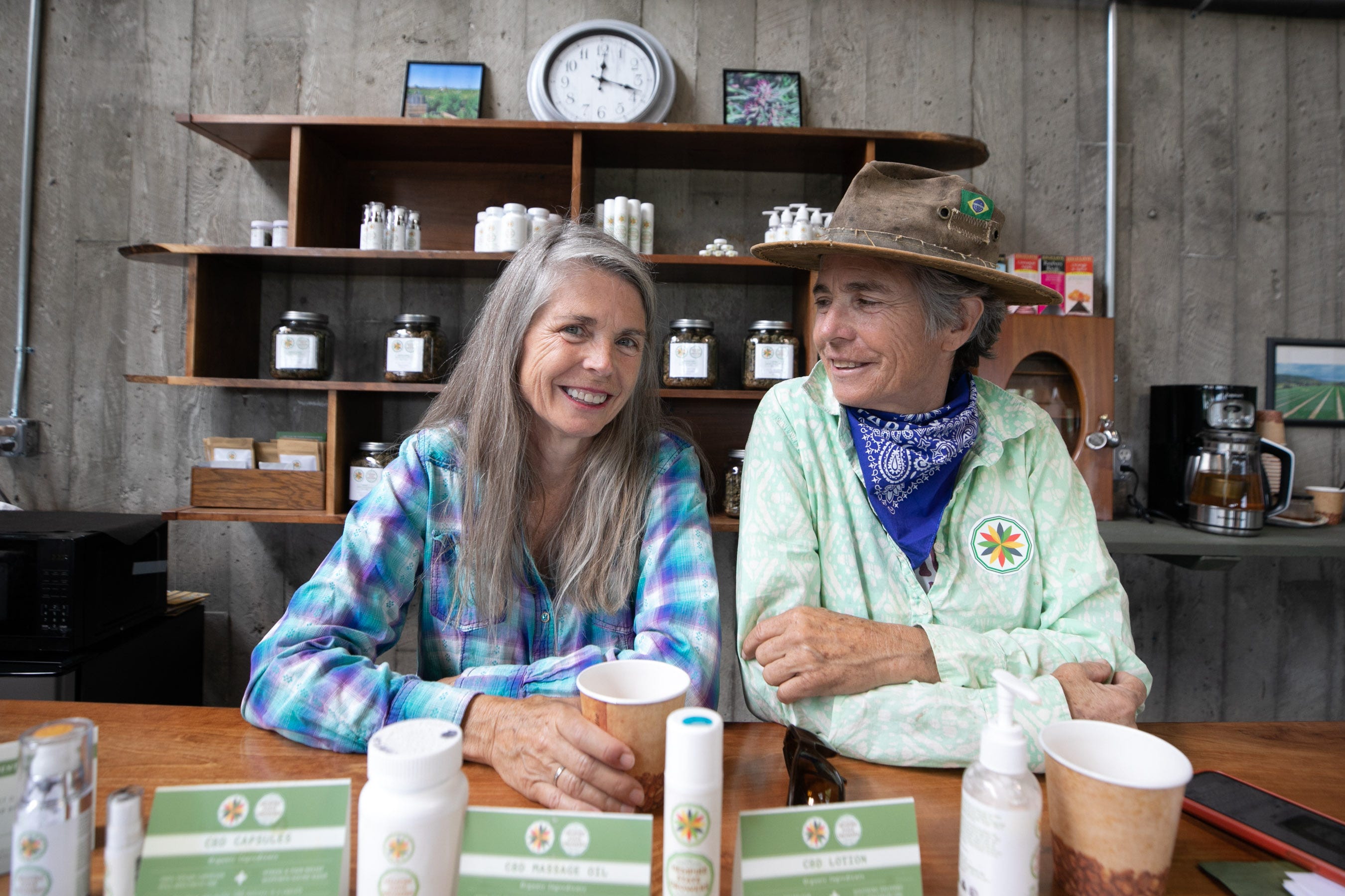 Gail Hepworth, left, and her twin sister Amy Hepworth, right, pose for a photo in their CBD shop at Hepworth Farms in Milton, NY on Friday, June 11, 2021.