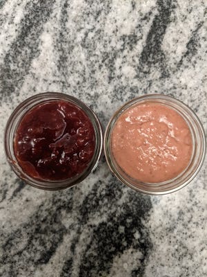 The fruit of some summer labor in the kitchen: A strawberry jam (left) and strawberry curd.