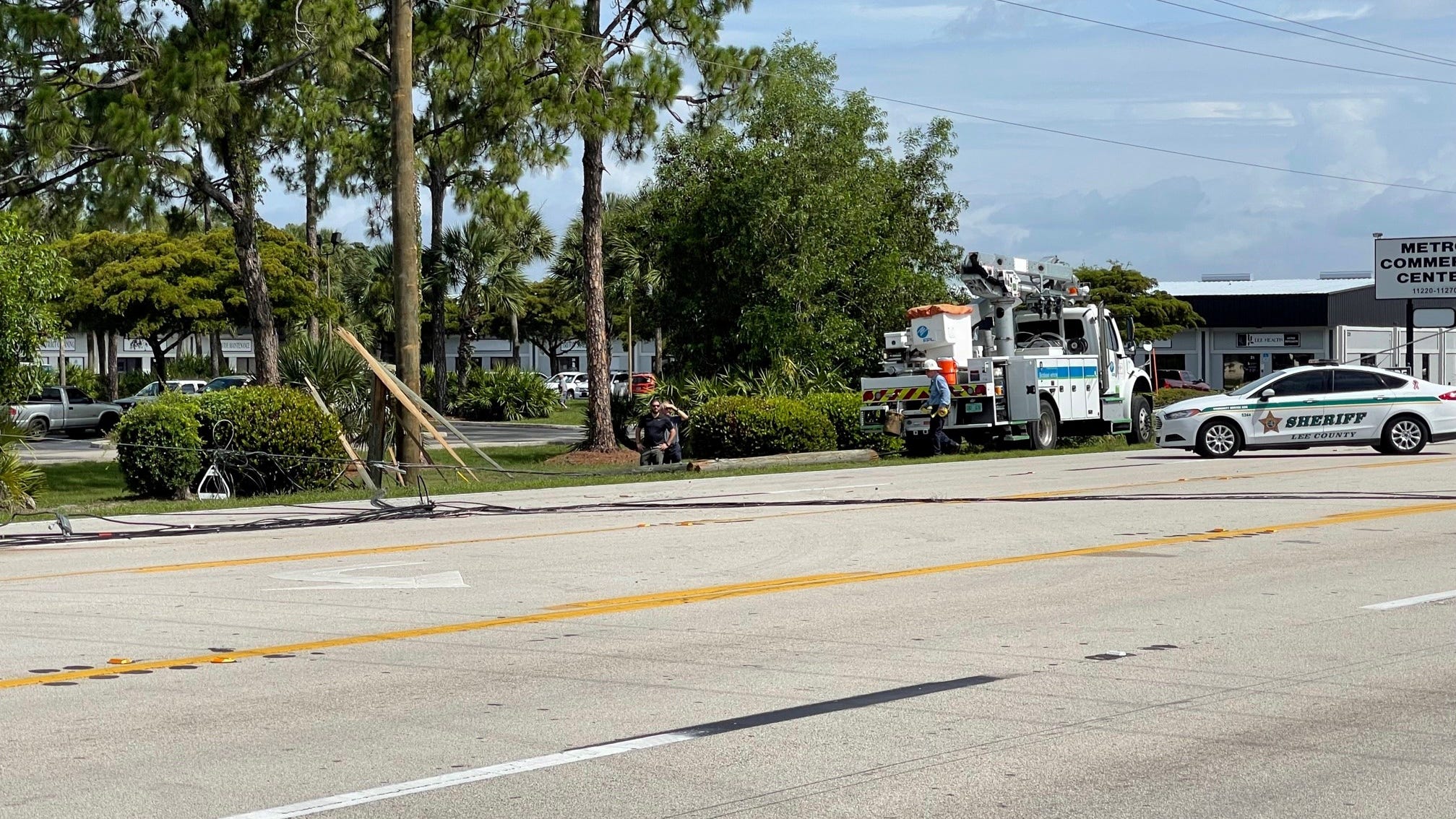 Shattered power pole with downed utility lines shuts down all of Metro Parkway in Fort Myers 3 Downed utility lines crossing Metro Parkway shut down the busy roadway Tuesday morning diverting traffic down side streets and briefly trapping a North Fort Myers woman in her SUV/