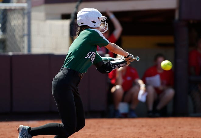 Portland St. Patrick's Rylee Scheurer bunts against Holton in their MHSAA quarterfinal game, Tuesday, June 15, 2021, in Mount Pleasant, Mich.
