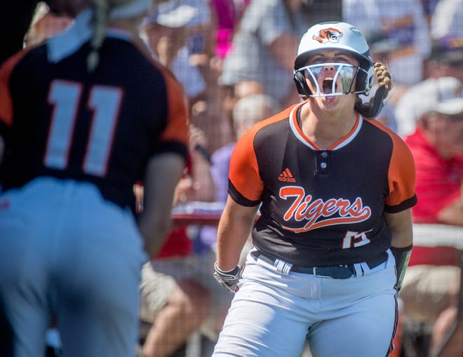 Illini Bluff’s Tinley Beecham (15) celebrates after scoring a run during last year's Class 1A softball state semifinals. Beecham on Monday delivered seven RBIs to lead the Tigers to a 12-4 supersectional win over Hardin Calhoun/Brussels.