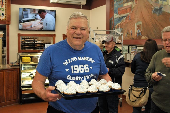 Marion Sluys serving a tasty treat inside the family's bakery in downtown Poulsbo.