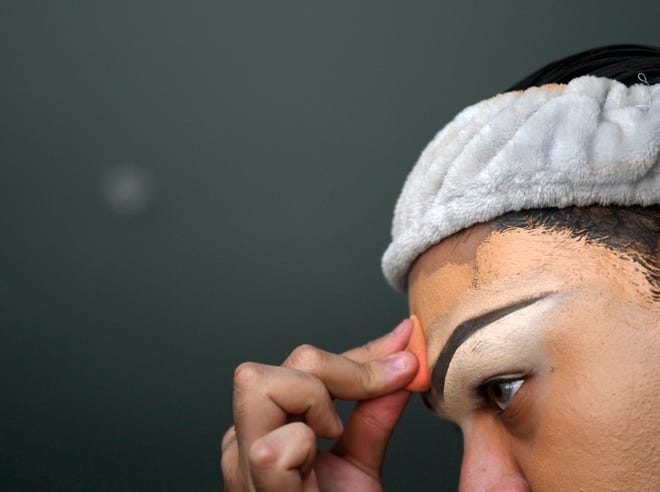 Frank Reyna blends his contour, Wednesday, May 26, 2021. "I really put a lot of focus and energy into subtlety, theatricality, precision, body isolation, eye movement and capturing every breath of the song and feeling it with your body," Reyna says about his lip-syncing style.