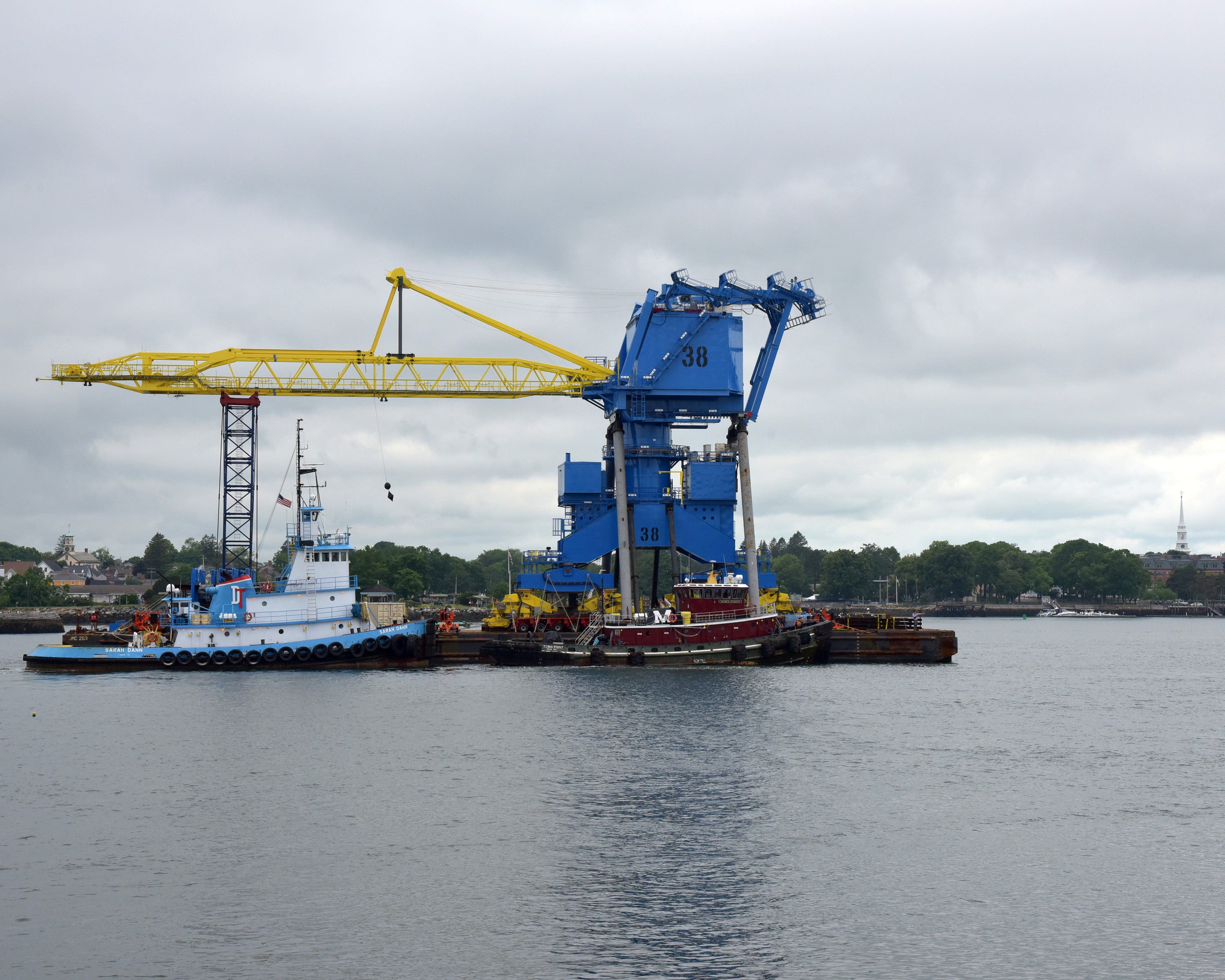 Blig Blue, the crane made in Manitowoc, arrives to U.S. Navy shipyard