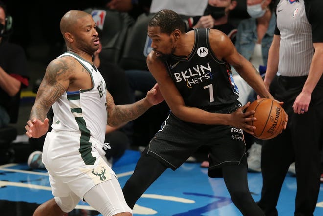 Bucks forward P.J. Tucker was the primary defender on Nets superstar Kevin Durant during the Eastern Conference semifinals. The Bucks acquired Tucker in a trade with Houston in March.