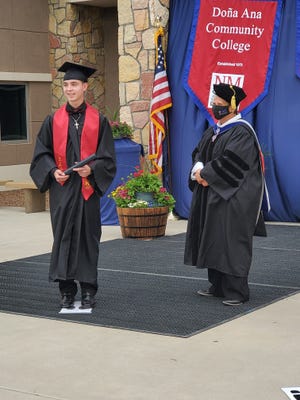 From left are Richard Soular and DACC President Dr. Moníca Torres outside DACC’s East Mesa campus on May 14, 2021 during spring commencement. Soular is a 2021 Arrowhead Park Early College High School and Doña Ana Community College (DACC) graduate.