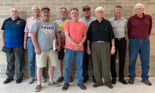 Among the luminaries at the Harrison County Basketball League Reunion Wednesday at Harrison Central High School Performing Arts Center were: FRONT ROW Kevin Love (Conotton Valley Class of 1972), Ray Ferrell (Lakeland Class of 1965) and Coach Gary Caviness (Lakeland 1965-70). BACK ROW Dr. Matthew J. Gladman, Fred Simpson (Lakeland Class of 1965), Jim Monigold (Conotton Valley Class of 1966), Dan Brown (Jewett Class of 1970), T. Dale Edwards (Franklin New Athens Class of 1968), and Denny Luyster (Lakeland Class of 1969). The players and coaches were part of a Q&A after Dr. Gladman’s presentation on his two-volume history of the Harrison County Basketball League and tournament.