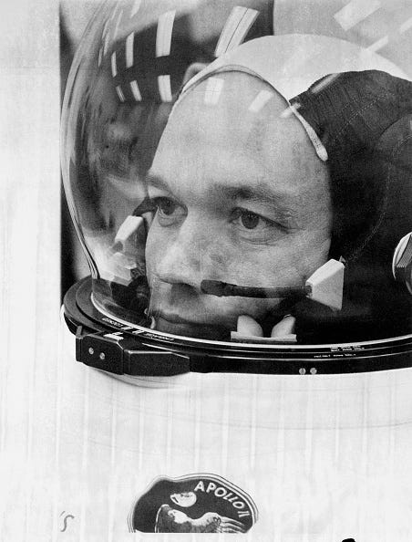 Astronaut Michael Collins prepares to board on Apollo 11 for the beginning of a mission to the moon 16 July 1969.