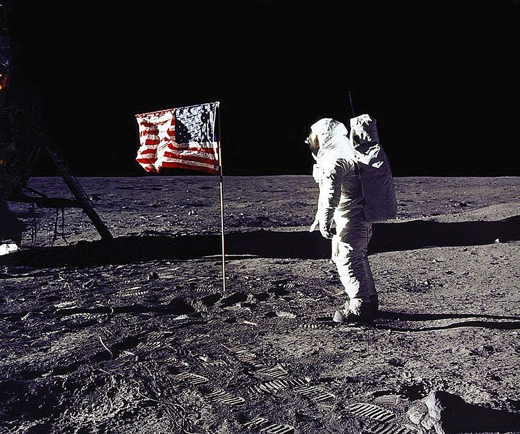 DC, UNITED STATES:  This 20 July 1969 file photo released by NASA shows astronaut Edwin E. "Buzz" Aldrin, Jr. saluting the US flag on the surface of the Moon during the Apollo 11 lunar mission.  The 20th July 1999 marks the 30th anniversary of the Apollo 11 mission and man's first walk on the Moon.          AFP PHOTO   NASA (Photo credit should read NASA/AFP via Getty Images)