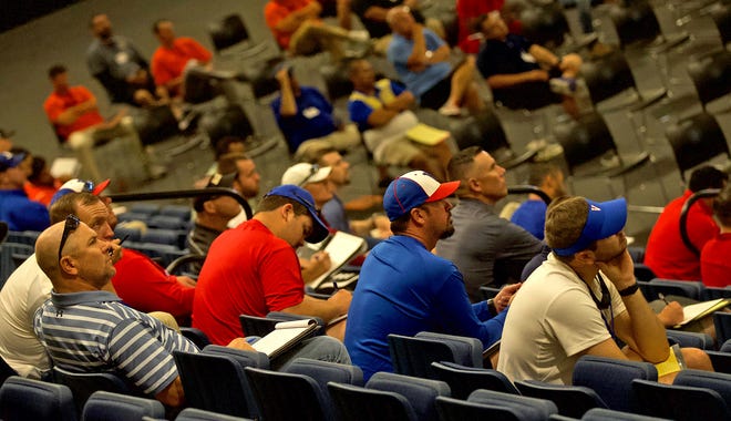 High school football coaches listen to a seminar at the Angelo Football Clinic in the Junell Center on Thursday, June 17, 2021.