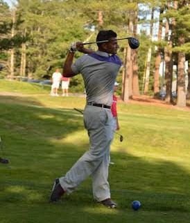 Nate Davis hits a shot during the annual Taunton City Open.