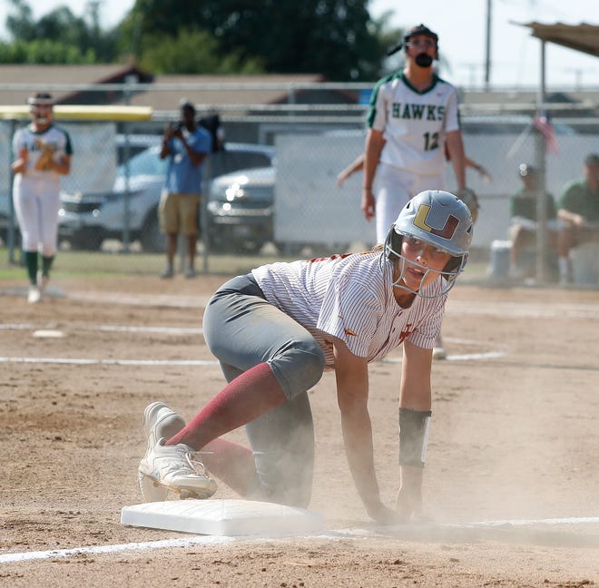 Mason Hatton of Tulare Union looks back before getting called out against Liberty-Madera Ranchos in a Central Section Division III championship game Thursday, June 17, 2021 in Tulare, Calif.