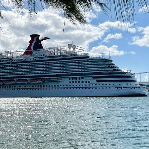 The "Carnival Vista" is seen moored at a quay in t