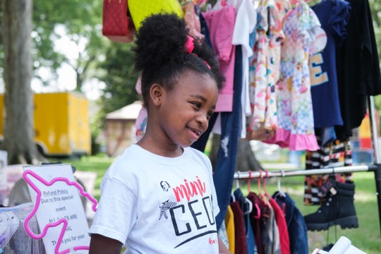 Ilana Kai, 7, CEO of Kai's World Kloset, discusses some of the items she is selling at the Juneteenth celebration on Saturday, June 19, 2021, in Memphis, TN.